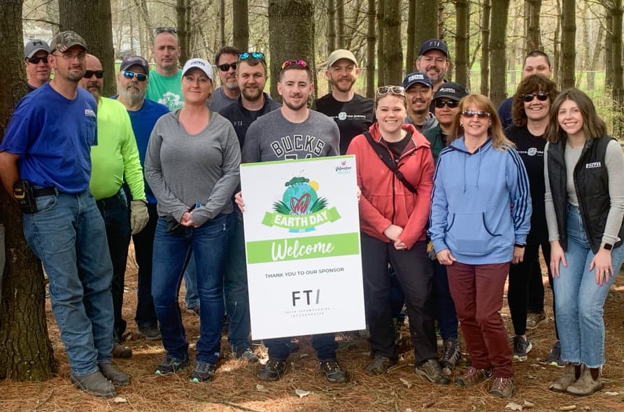 FTI team members volunteering on Earth Day