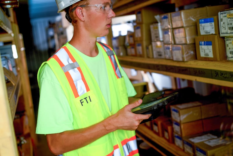 FTI productivity team member working on jobsite