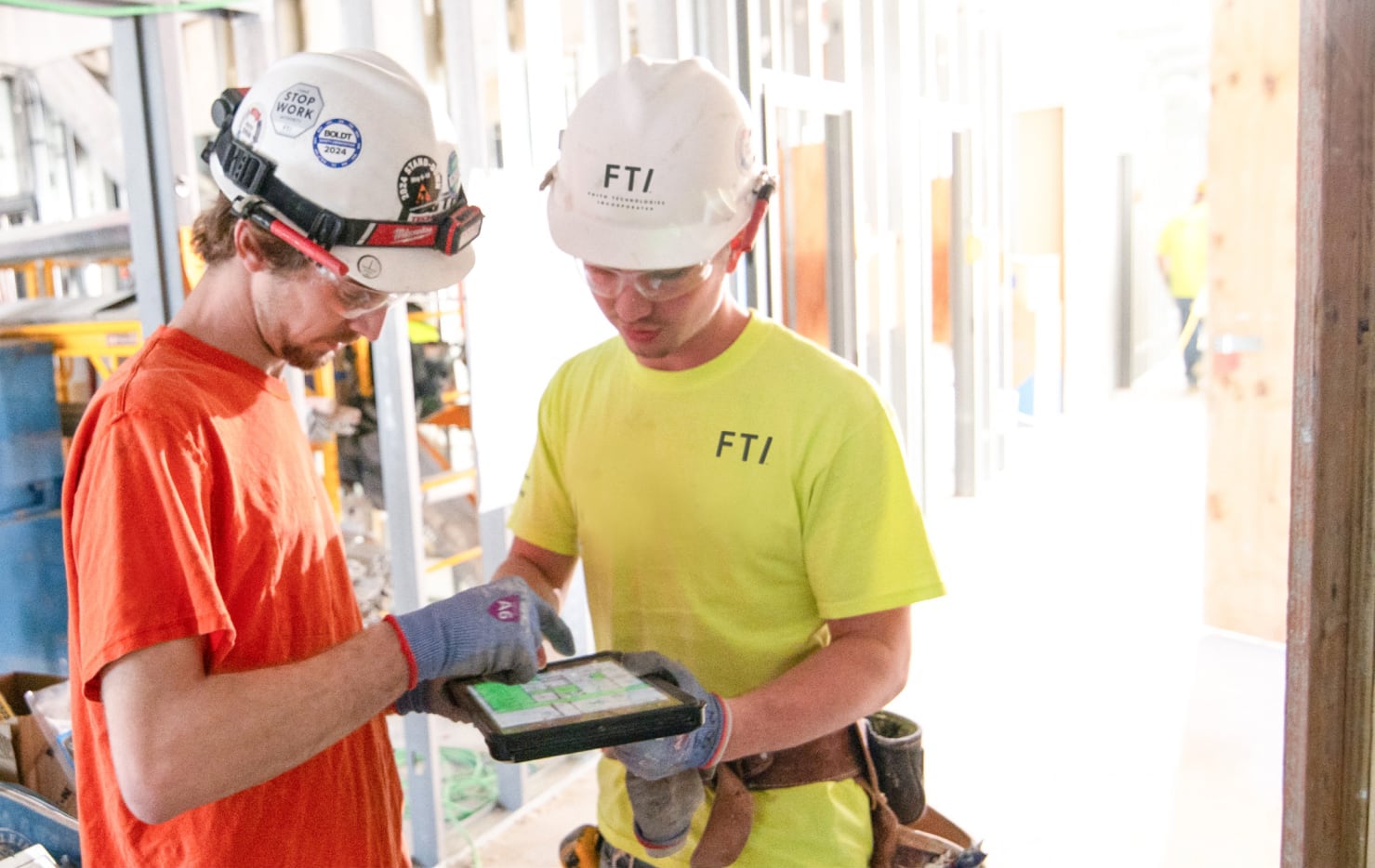 FTI team members looking at table on the jobsite