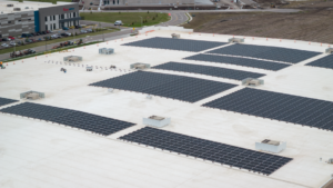 Excellerate is putting renewable energy into action with its massive rooftop solar installation in Olathe, Kansas. Designed to offset the electrical usage of the facility, the 2.16-megawatt system highlights FTI’s leadership in sustainable industrial solutions. Photos of Faith Technologies Incorporated's (FTI) rooftop solar project in Olathe, Kansas.