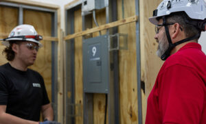 FTI Team Members Talking in Training Lab